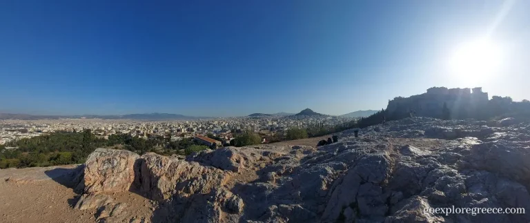 On Areopagus Hill viewing the Acropolis of Athens and Lycabettus hill in the background