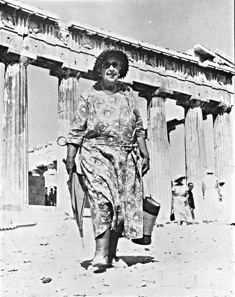 English writer and author Agatha Christie standing in front of the Parthenon on the Acropolis of Athens in 1958