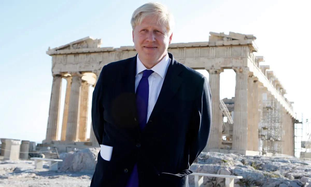 UK Prime Minister Boris Johnson standing in front of the Parthenon on the Acropolis of Athens in 2012