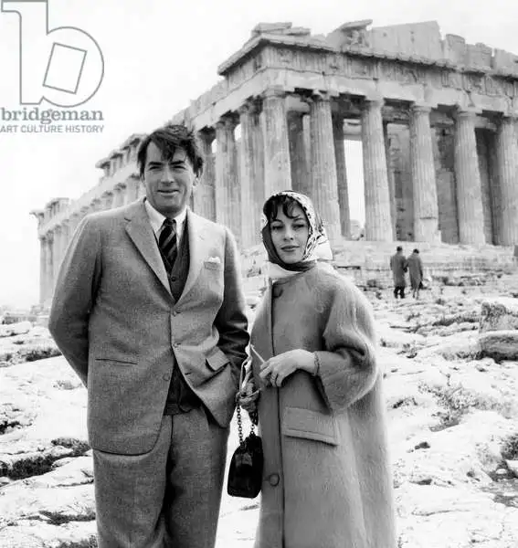 Actor Gregory Peck standing in front of the Parthenon on the Acropolis of Athens in 1960