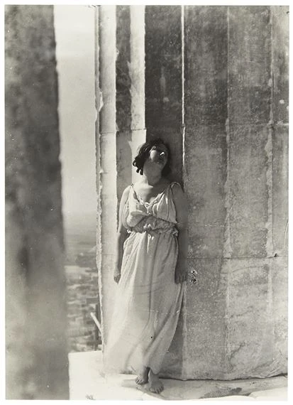 Amercian dancer Isadora Duncan standing in front of the Parthenon on the Acropolis of Athens in 1920