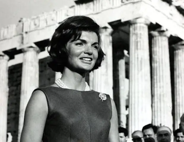 Close-up of American socialite, writer, photographer, and first lady of the United States Jackie Kennedy standing in front of the Parthenon on the Acropolis of Athens in 1961