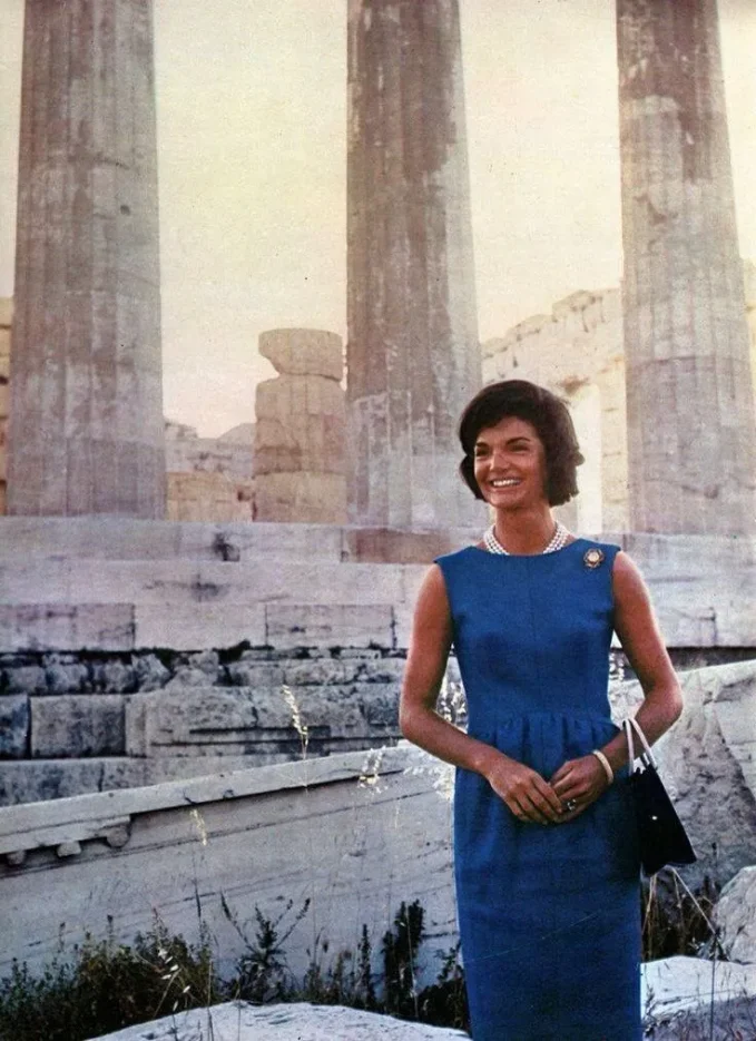 American socialite, writer, photographer, and first lady of the United States Jackie Kennedy standing in front of the Parthenon on the Acropolis of Athens in 1961