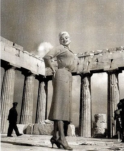 American actress, singer, nightclub entertainer, and Playboy Playmate Jayne Mansfield standing in front of the Parthenon on the Acropolis of Athens in 1957