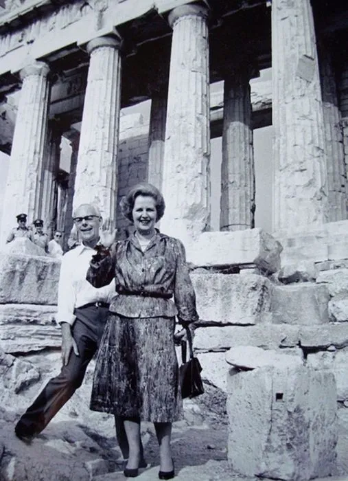 Prime Minister Margaret Thatcher with her husban Dennis standing in front of the Parthenon on the Acropolis of Athens in 1980