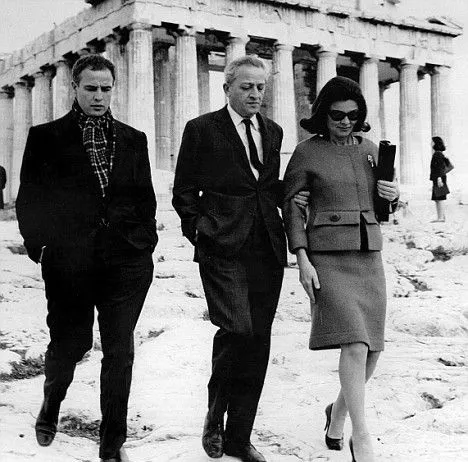 American actor Marlon Brando walking in front of the Parthenon on the Acropolis of Athens in 1958