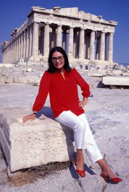 The famous Greek singer Nana Mouskouri seated in front of the Parthenon on the Acropolis of Athens in 1980