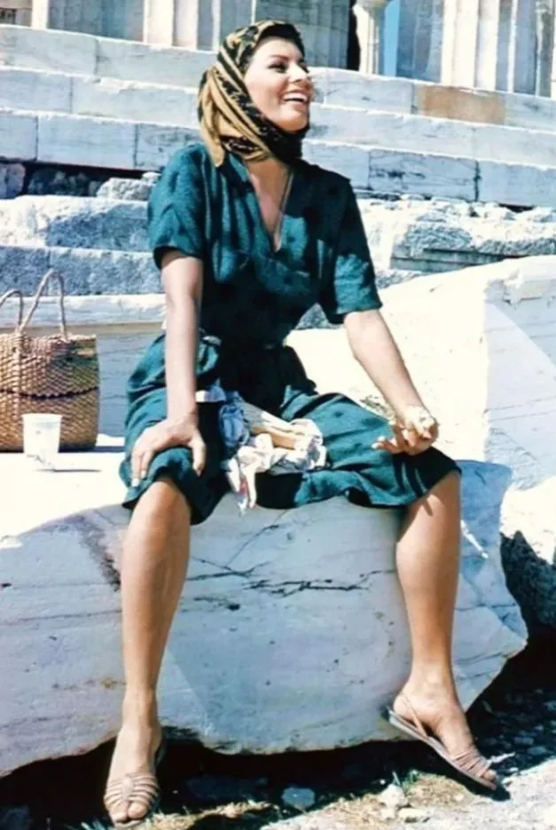 The famous actress and celebrity Sophia Loren sat in front of the Parthenon on the Acropolis of Athens in 1956