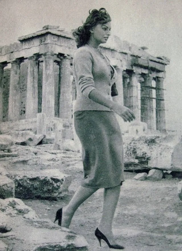 The famous actress and celebrity Sophia Loren walking in front of the Parthenon on the Acropolis of Athens in 1956