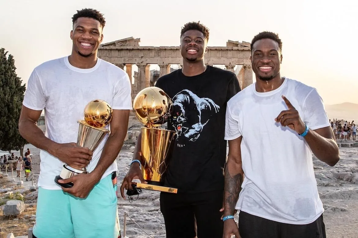 After bringing the NBA championship trophy home to their native Greece this week, Giannis and Thanasis Antetokounmpo climbed the Acropolis on Wednesday where they posed in front of the Parthenon and proudly held their memorabilia.