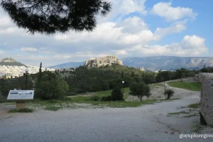 The Acropolis of Athens as viewed from the Pnyx. Lycabettus Hill is in the background on the left
