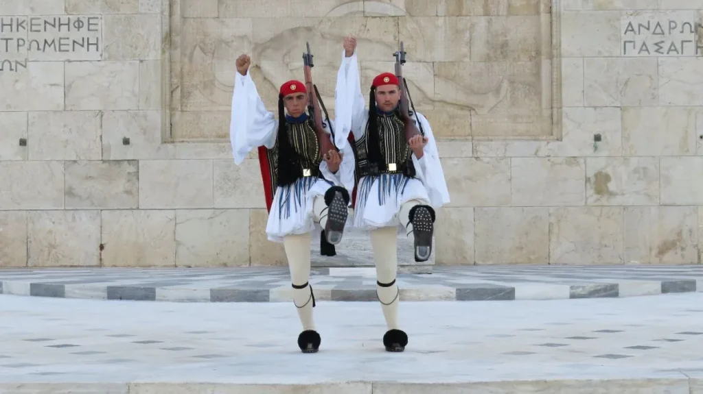 Two evzones performing the changing of guard in Athens.