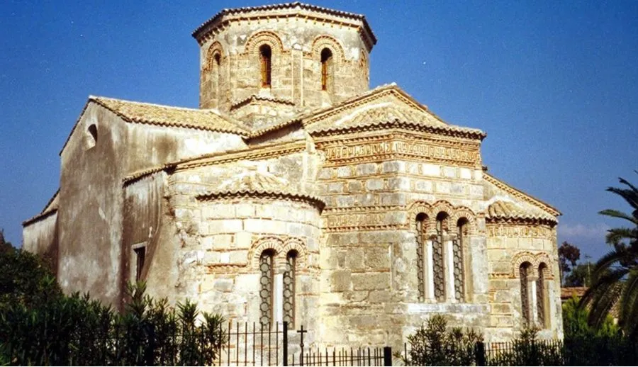 The Church of Saint Jason and Saint Sosipater stands tall, draped in iconic red and white stripes. Situated on the Greek island of Corfu in the Ionian Islands, Greece