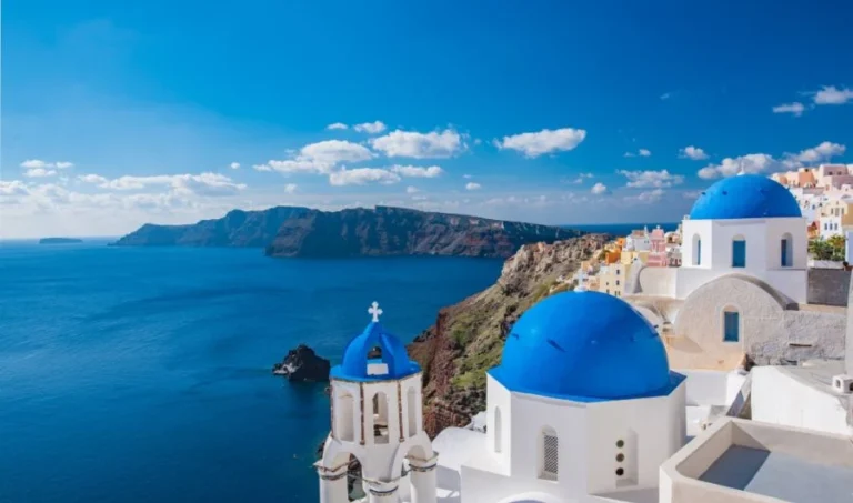 Blue Domes of Santorini overlooking the caldera. One of the great things to see on a guided tour