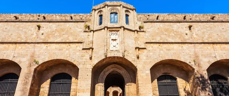 Looking at the front entrance and archways of the Archaeological Museum of Rhodes