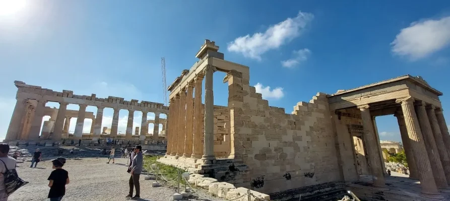 The West side of the Erechtheion and to the right is the North Portico. In the background is the Parthenon.