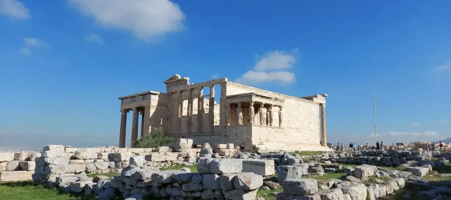 The Erechtheion on the Acropolis of Athens Greece. Part of the The North Portico is on the left, and the female Caryatids on the right