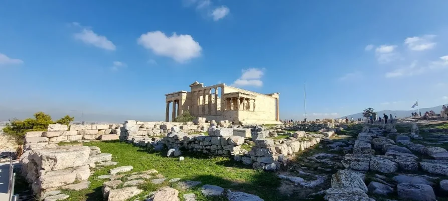 The Erechtheion on the Acropolis of Athens Greece. Part of the The North Portico is on the left, and the female Caryatids on the right