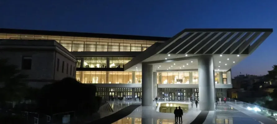 Night time view of the front of the Acropolis Museum in Athens at night