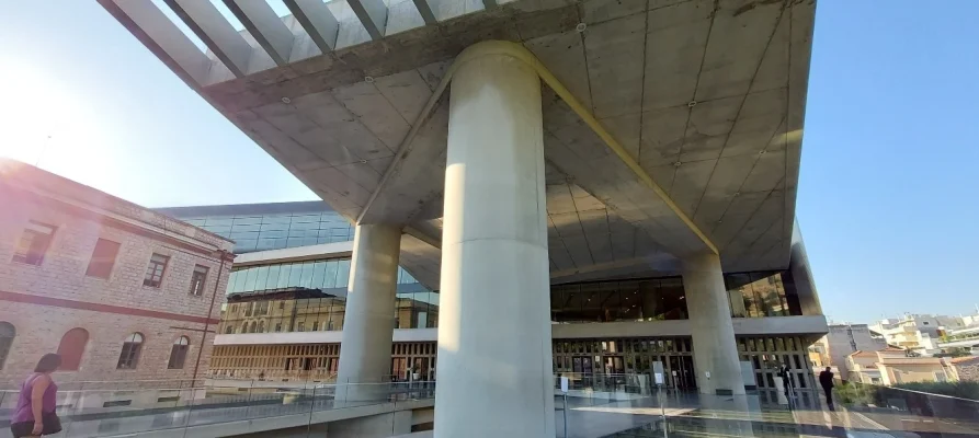 Looking up at the overhang of the Acropolis Museum in Athens