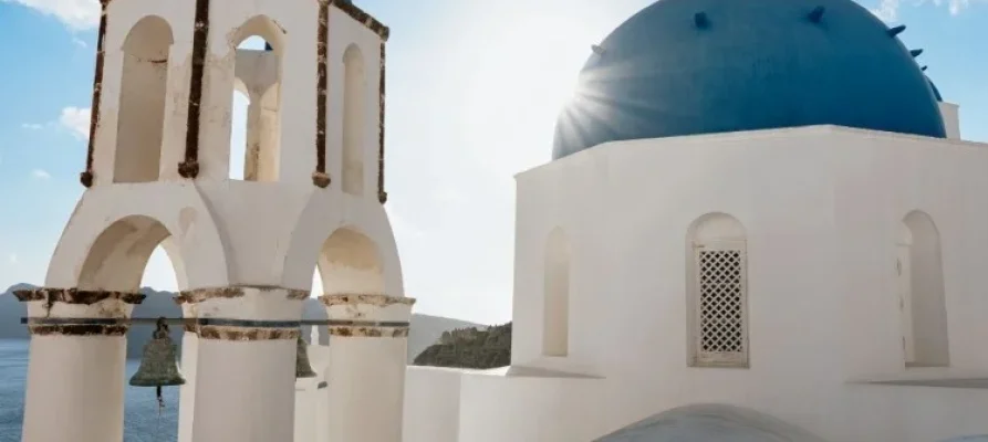 The Blue Domed Churches on the Greek Island of Santorini. Seen as part of the Private Half-Day Tour in Santorini