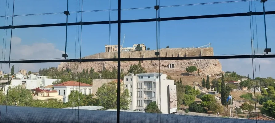 The Acropolis of Athens as seen from inside the Acropolis Museum on the third floor