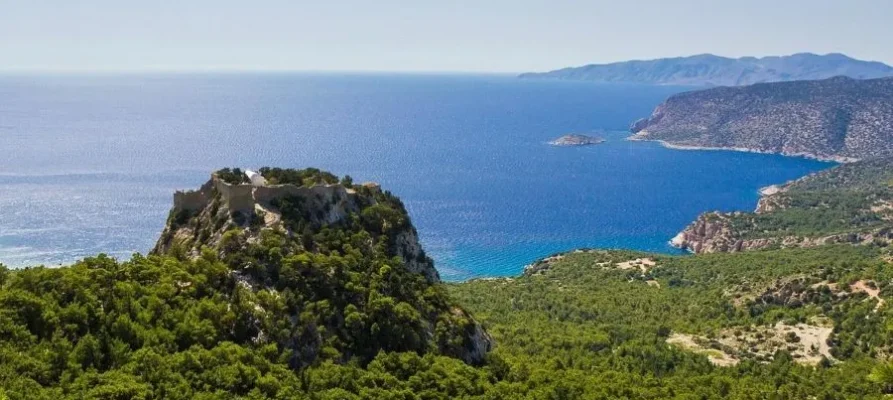 far away view of Monolithos Castle on the Greek island of Rhodes in the Dodecanese