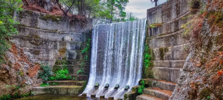 A 22 foot high man-made waterfall at the Seven Springs in Rhodes, Greece