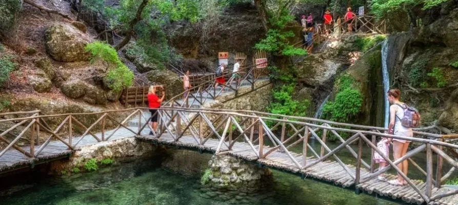 Three wooden bridges meeting at a point at the Butterflies Valley Rhodes, Greece